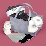Basics gift set includes muslin cotton burp cloths, gray diapper caddy, gray car seat cover and set of 8 bandana bibs for baby