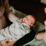 Plaid Swaddle for baby.