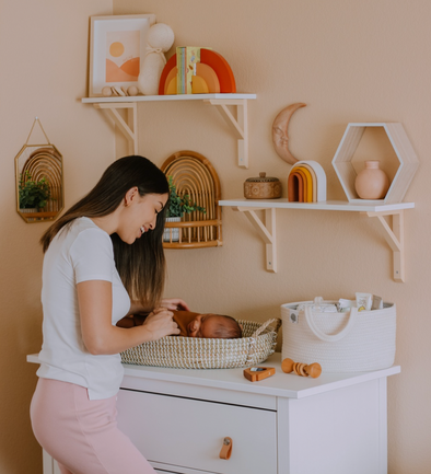Mom and Baby in Baby Girl Nursery