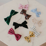 Assorted bow clip hair accessories for little girls.