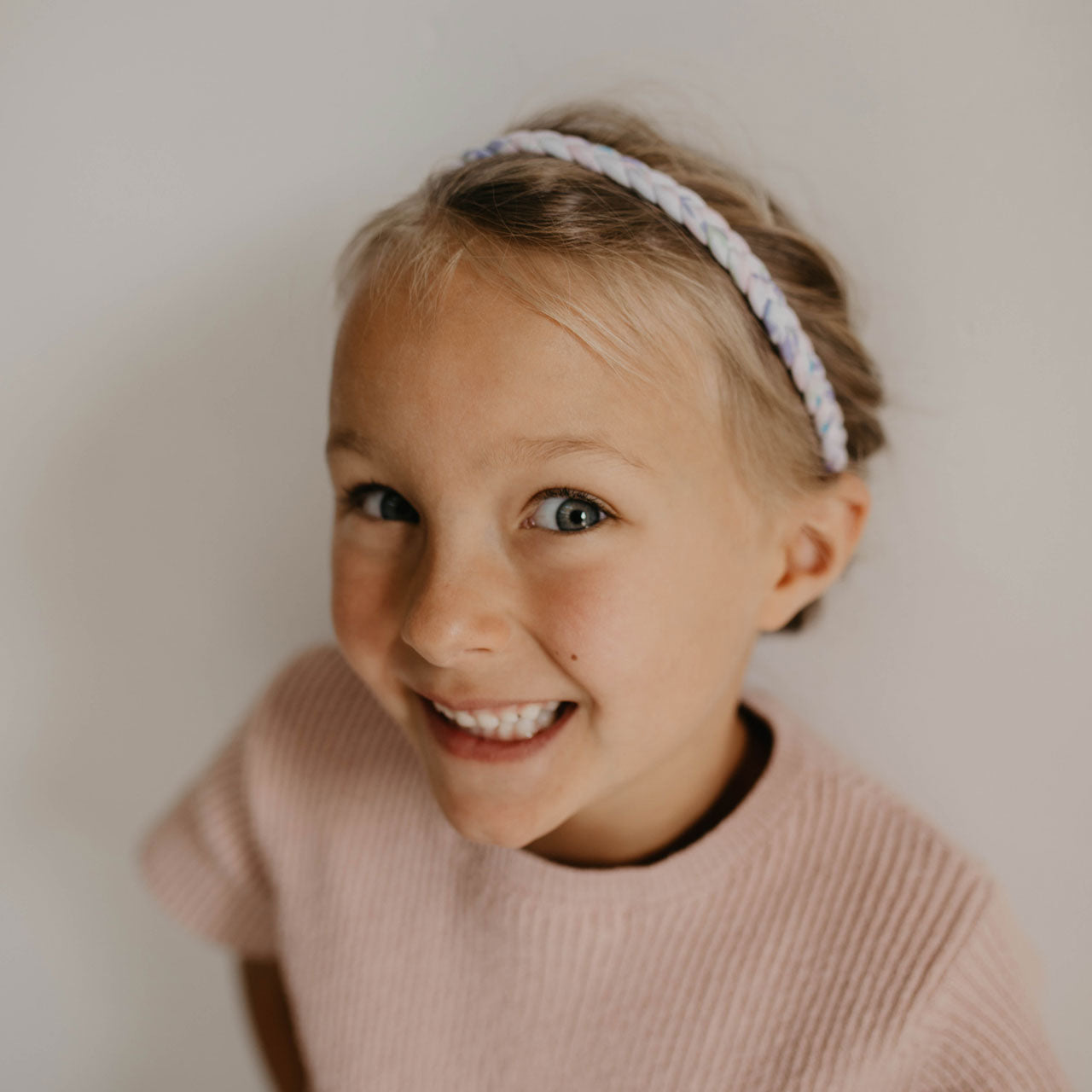 Purple braided headband for girl.