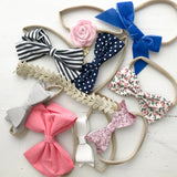 The Essentials Bows and Headbands Set: set of 10 hair bows for baby.