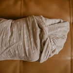 Neutral Swaddle for baby.