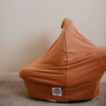 Multi-use cover for car seat.
