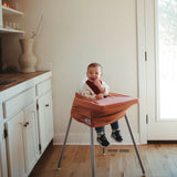 Multi-use cover for high chair. 