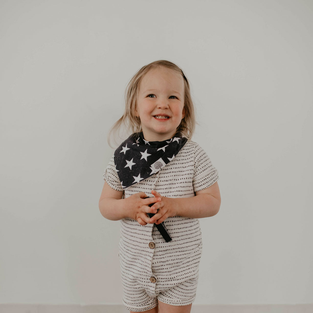 Blue Bib with White Stars for baby. 