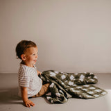 Green buffalo quilt for toddler.