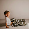 Green buffalo quilt for toddler.