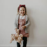 Maroon cable knit knotted headband for toddler girl.