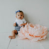 White bandana bib for baby girl.