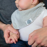 Green and white bandana bib for baby boy.