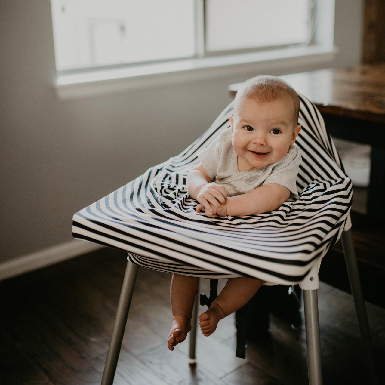Multi-use cover for high chair. 