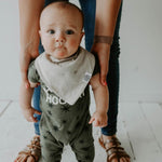 Gray bandana bib for baby boy.