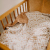 Prairie floral quilt in crib