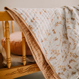 Prairie floral quilt on crib