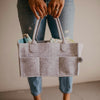 Diaper Caddy carried by mom. 