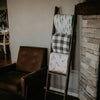Hanging Muslin Quilts on ladder. 