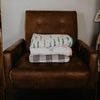 Stack of Muslin Quilts. 