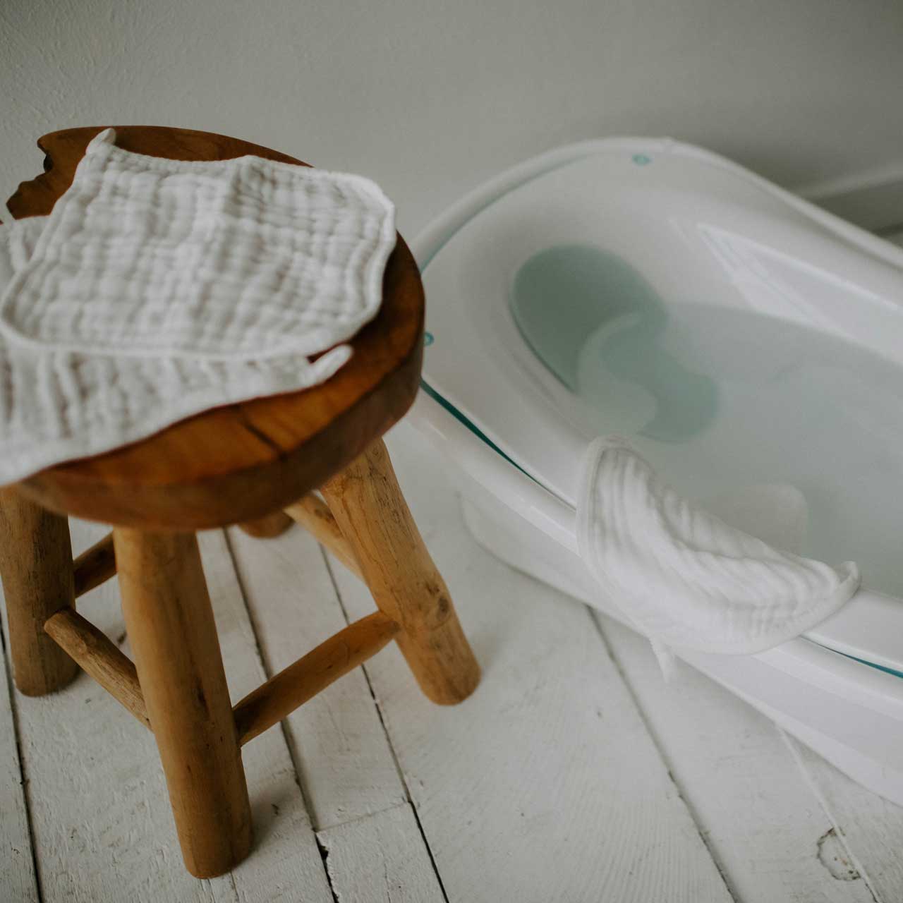 Washcloth on stool.