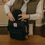Black diaper backpack and black belt bag